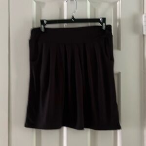 Excellent condition Venus Knit mini skirt. Black with pockets.